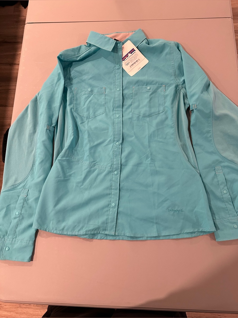Patagonia women’s long sleeve Sol Patrol Shirt Howling Turquois M NWT